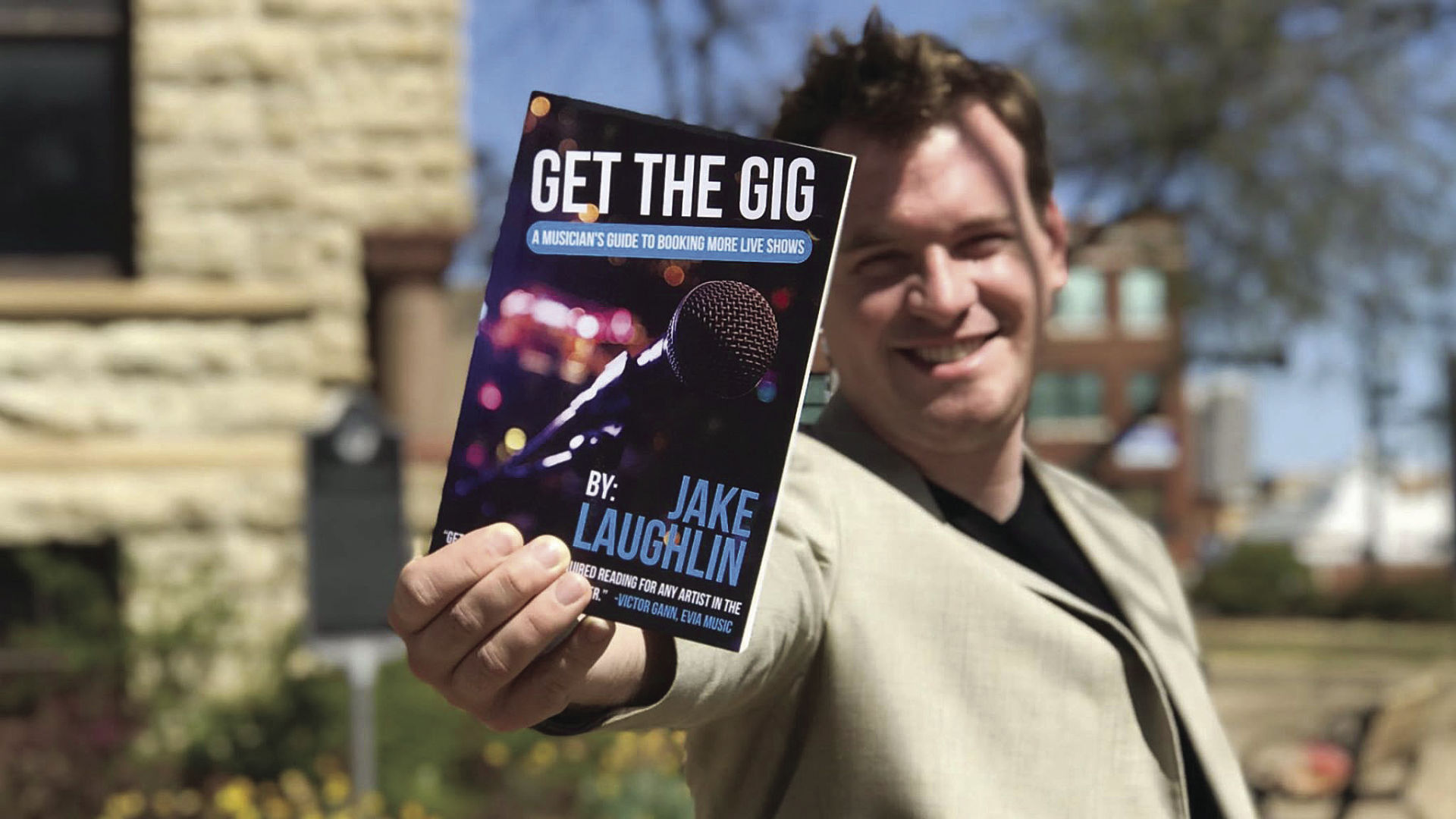 Jake Laughlin with book